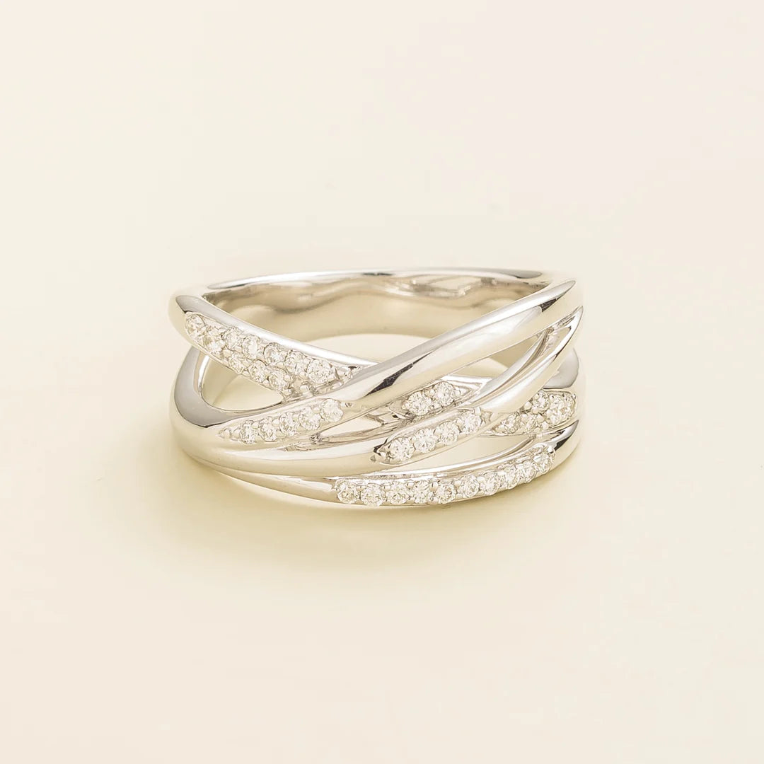 Juvetti white gold crossover ring set with round lab-grown diamonds.