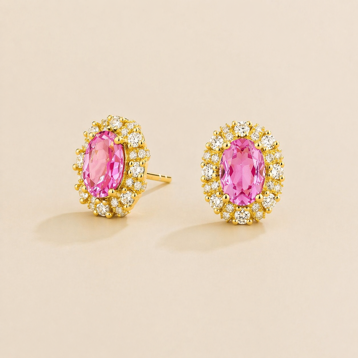 Viva Oval Pink Sapphire Halo Stud Earrings with Diamond Accents in Gold
