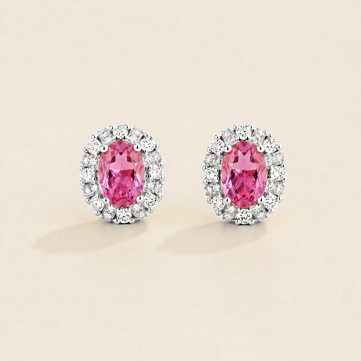 Oval lab-grown pink sapphire halo Viva stud earrings with diamond accents in white gold | Juvetti London