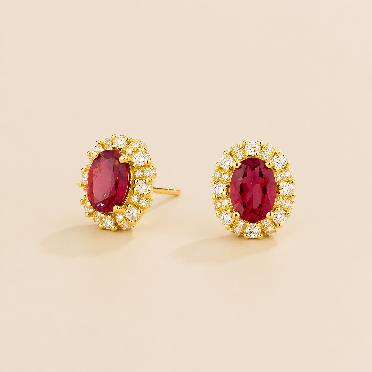 Viva Oval Ruby Halo Stud Earrings with Diamond Accents in Gold
