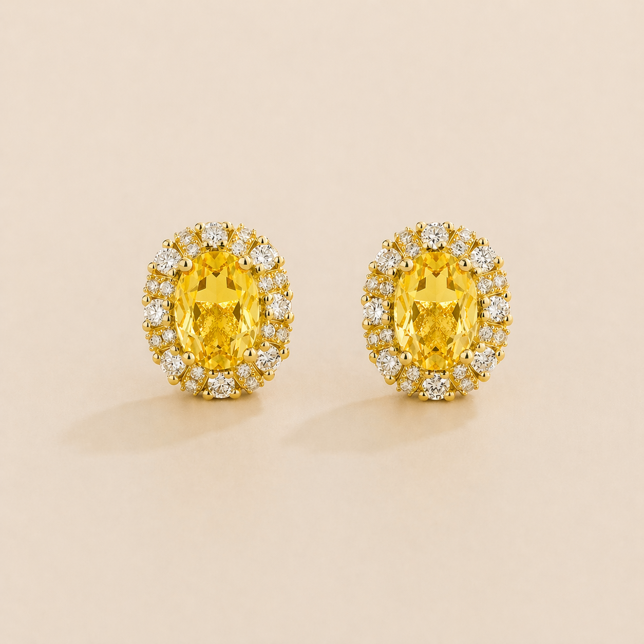 Viva Oval Yellow Sapphire Halo Stud Earrings with Diamond Accents in Gold