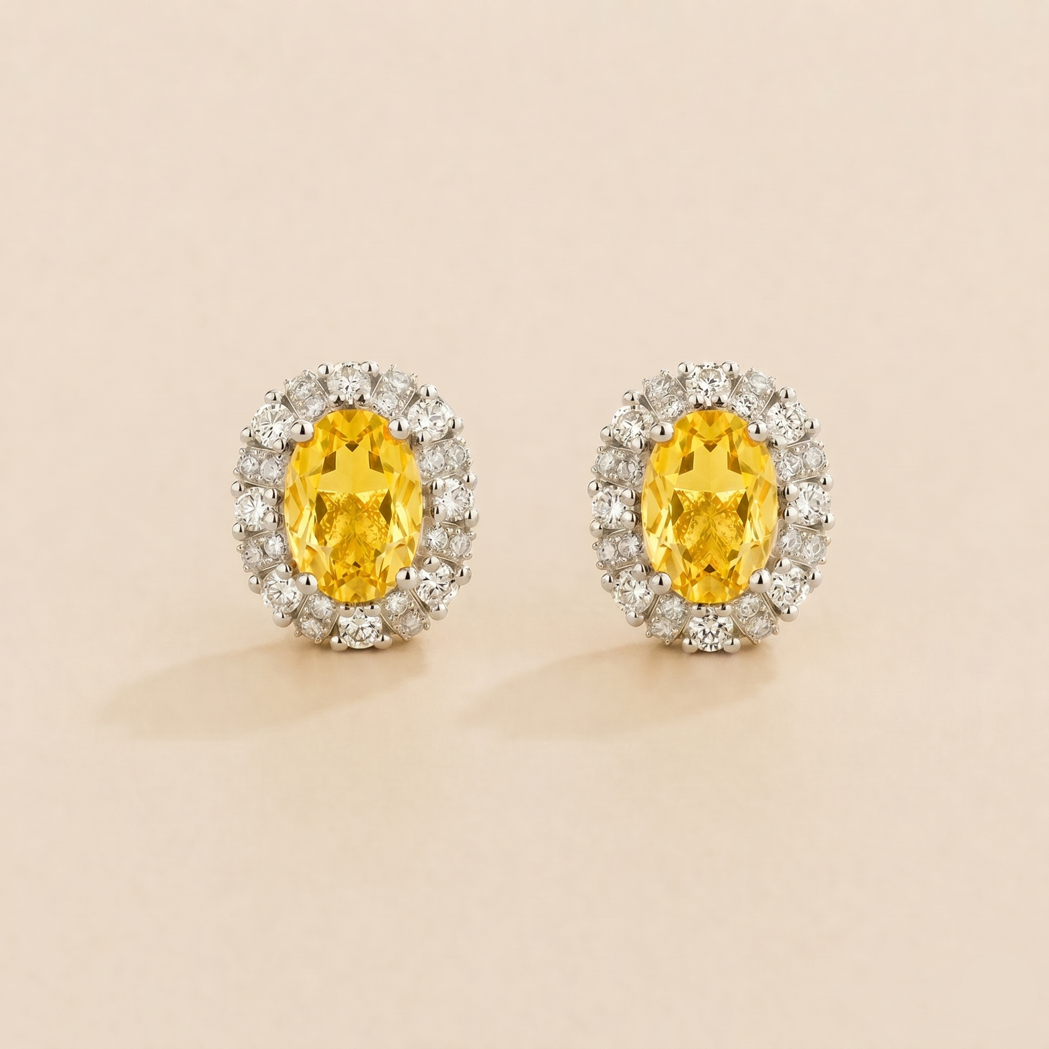Viva Oval Yellow Sapphire Halo Stud Earrings with Diamond Accents in White Gold