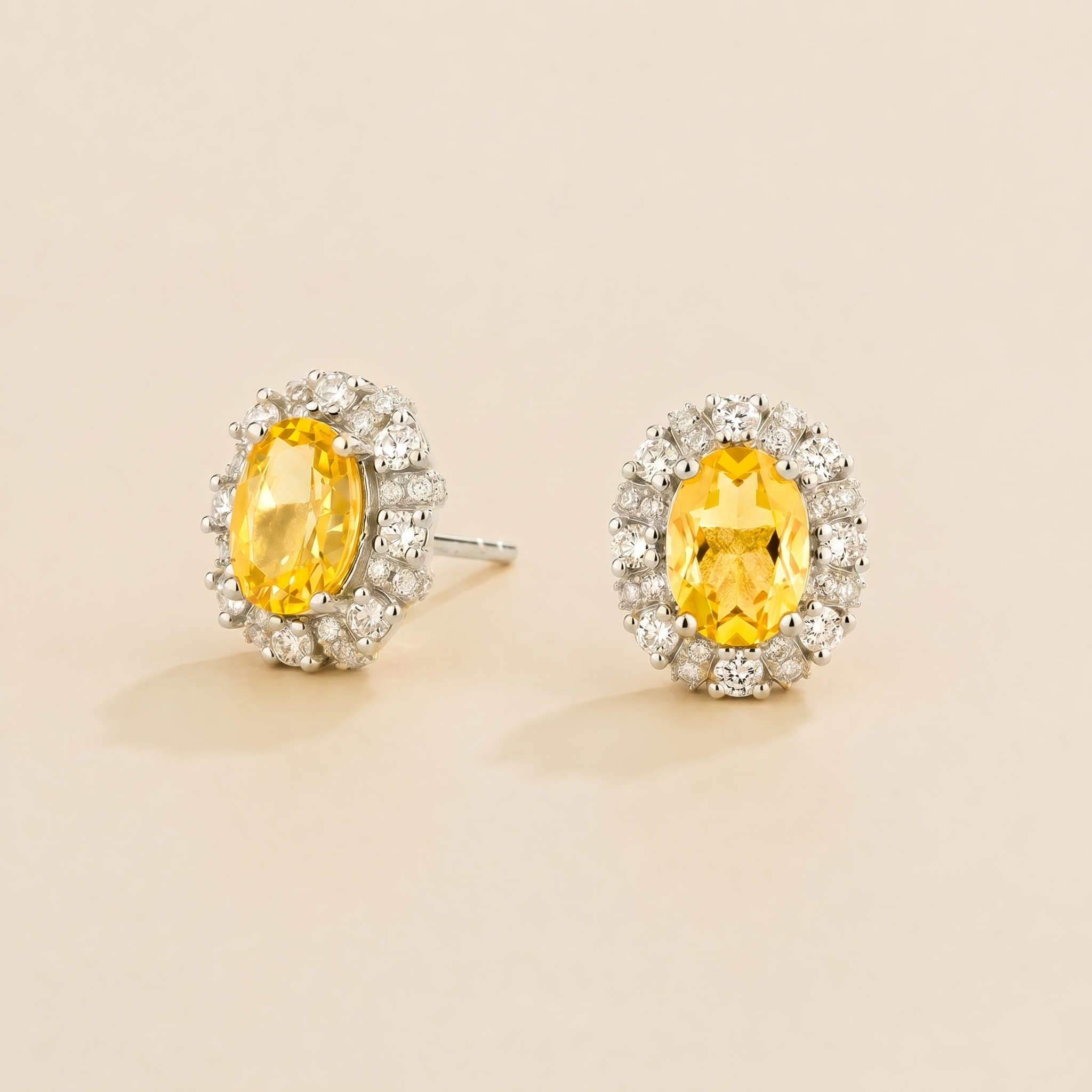 Viva Oval Yellow Sapphire Halo Stud Earrings with Diamond Accents in White Gold