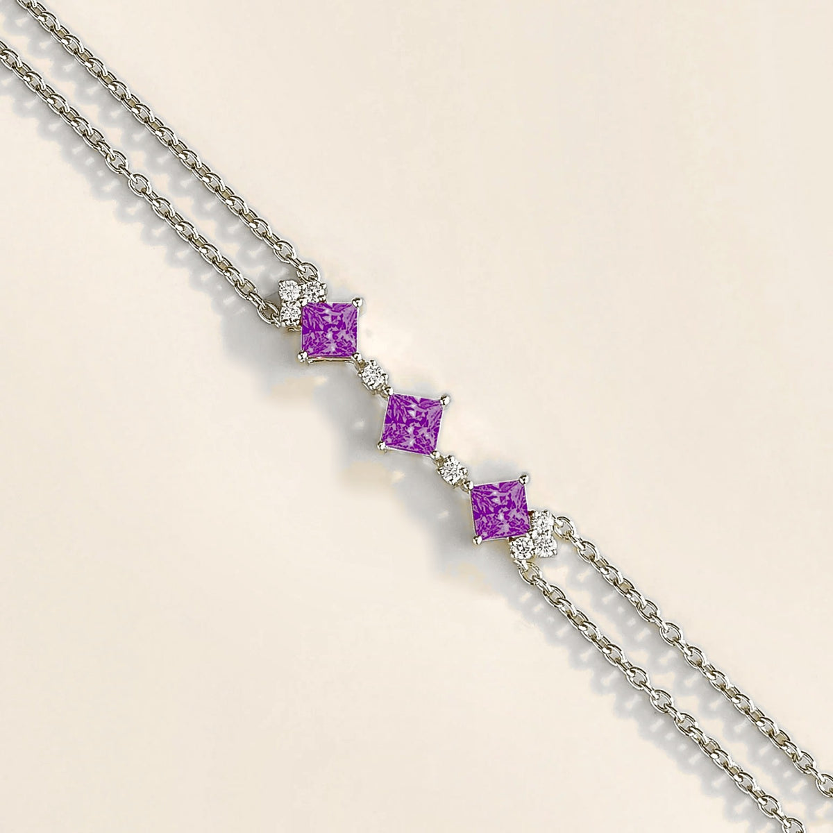 double chain white gold bracelet featuring purple sapphire gemstones and lab grown diamonds