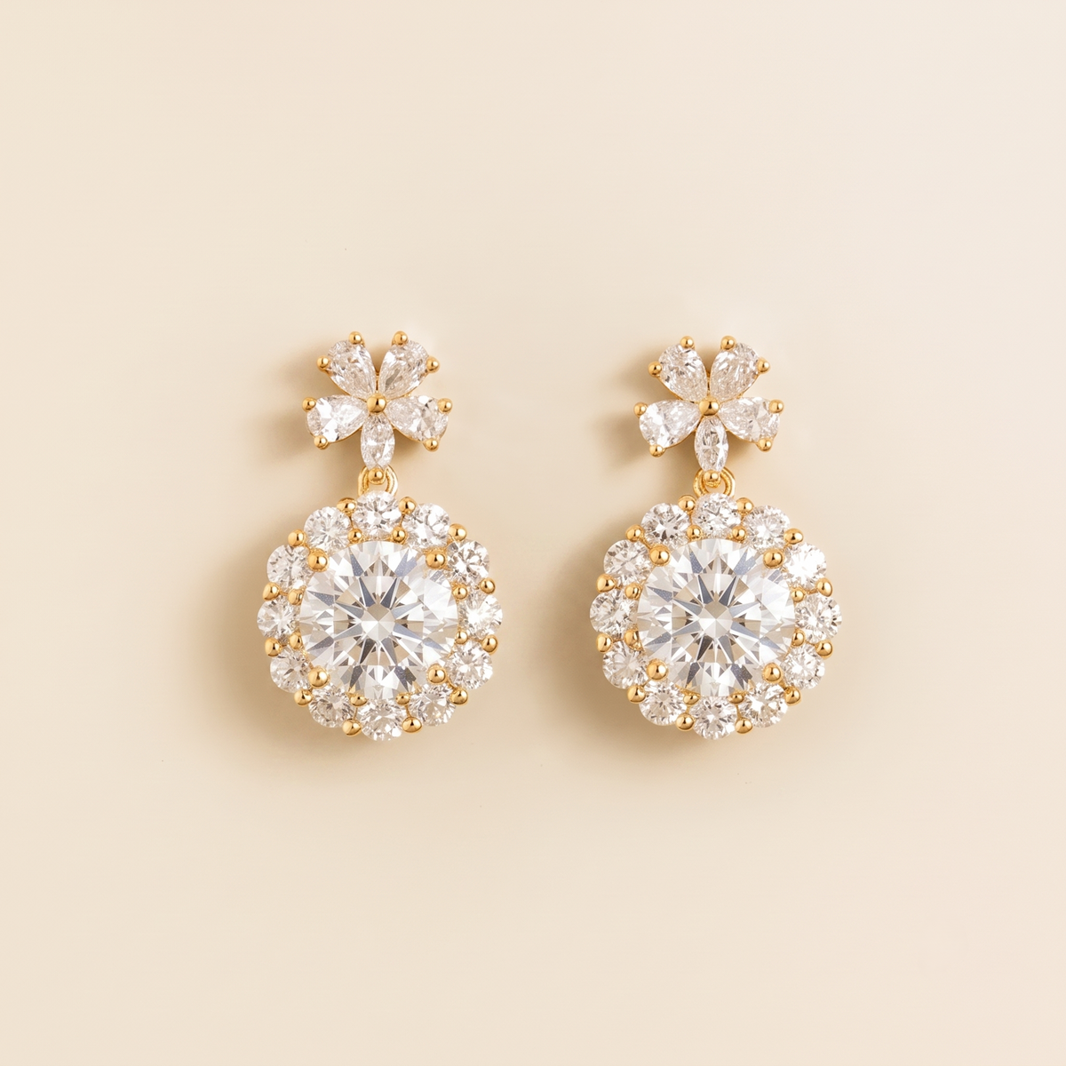 Antoinette round diamond halo pendant earrings with flower bail in gold | Juvetti