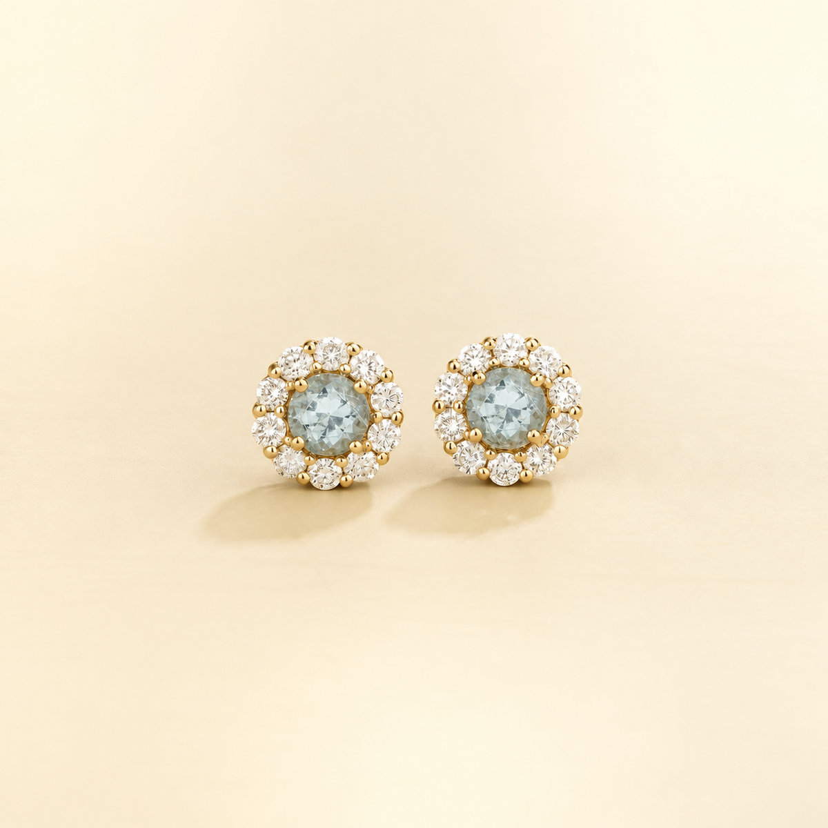 Floret round aquamarine and diamond halo stud earrings in yellow gold, front view