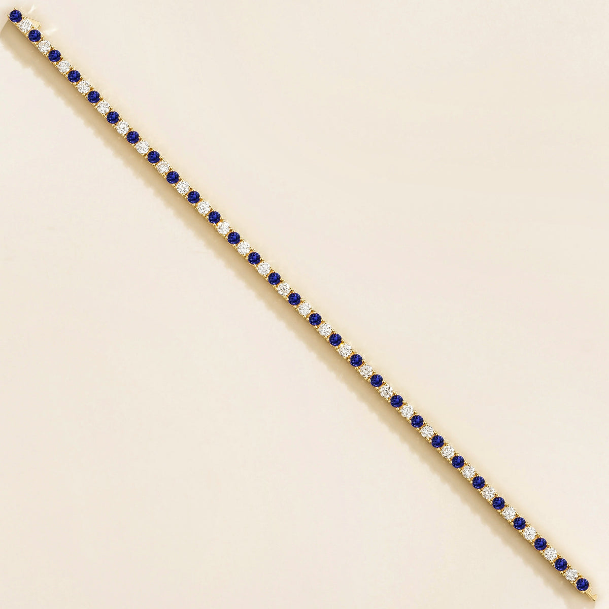 Stacy Blue Sapphire & Diamond Tennis Bracelet in Gold – front view