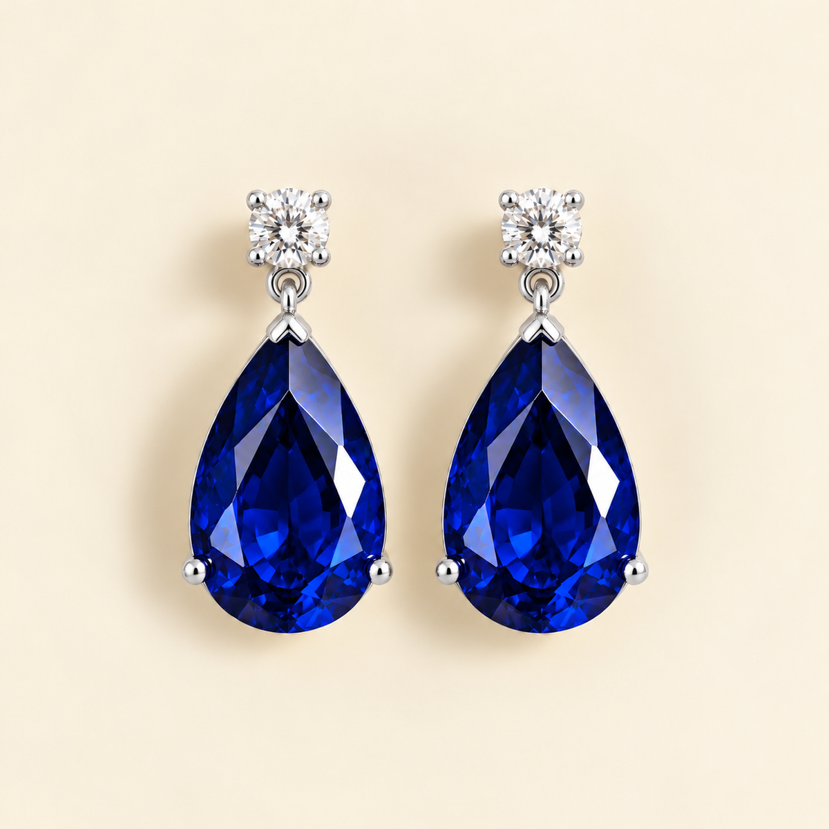 Pisa blue sapphire and diamond large pear drop earrings in white gold