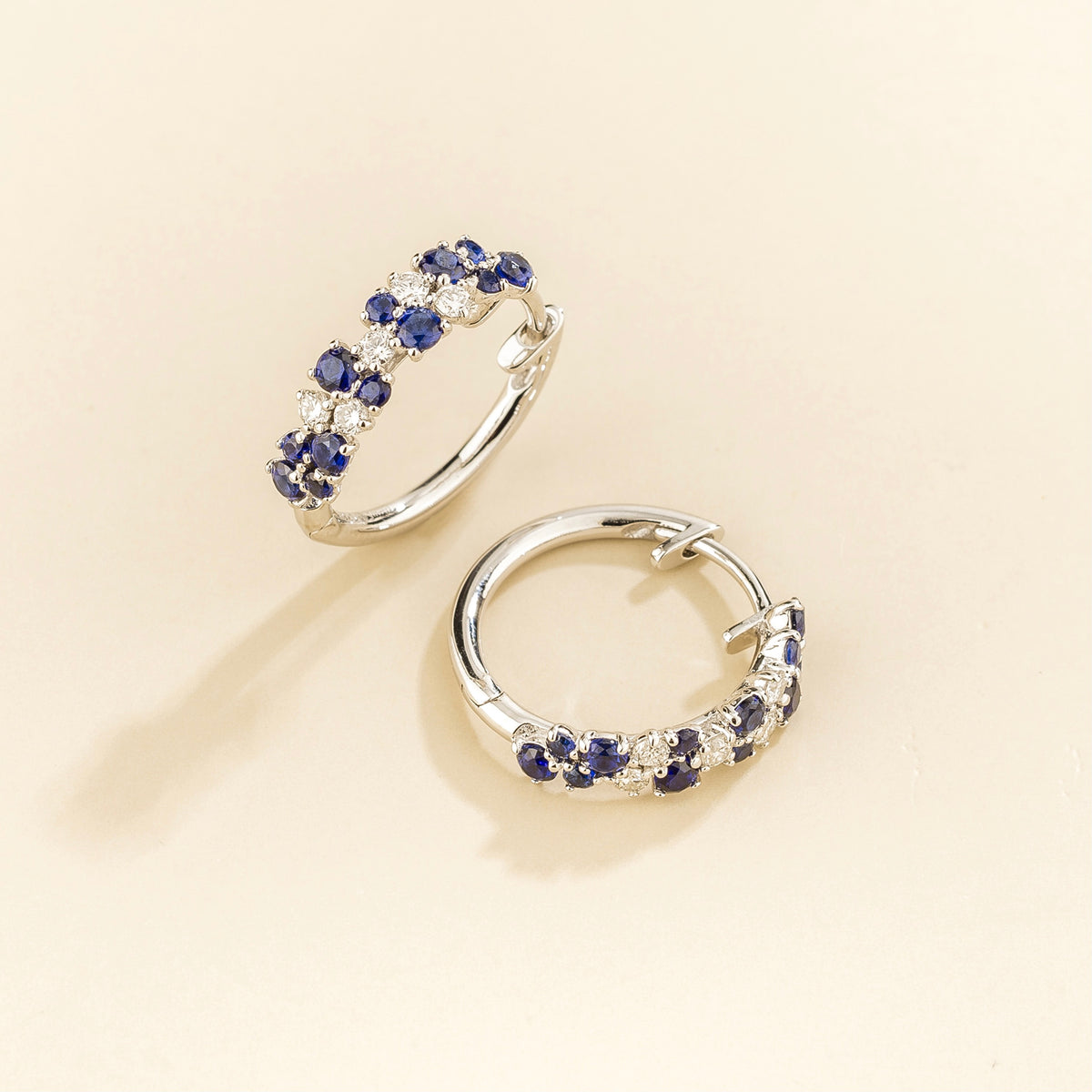 Starry Blue Sapphire & Diamond Cluster Huggie Hoop Earrings in White Gold