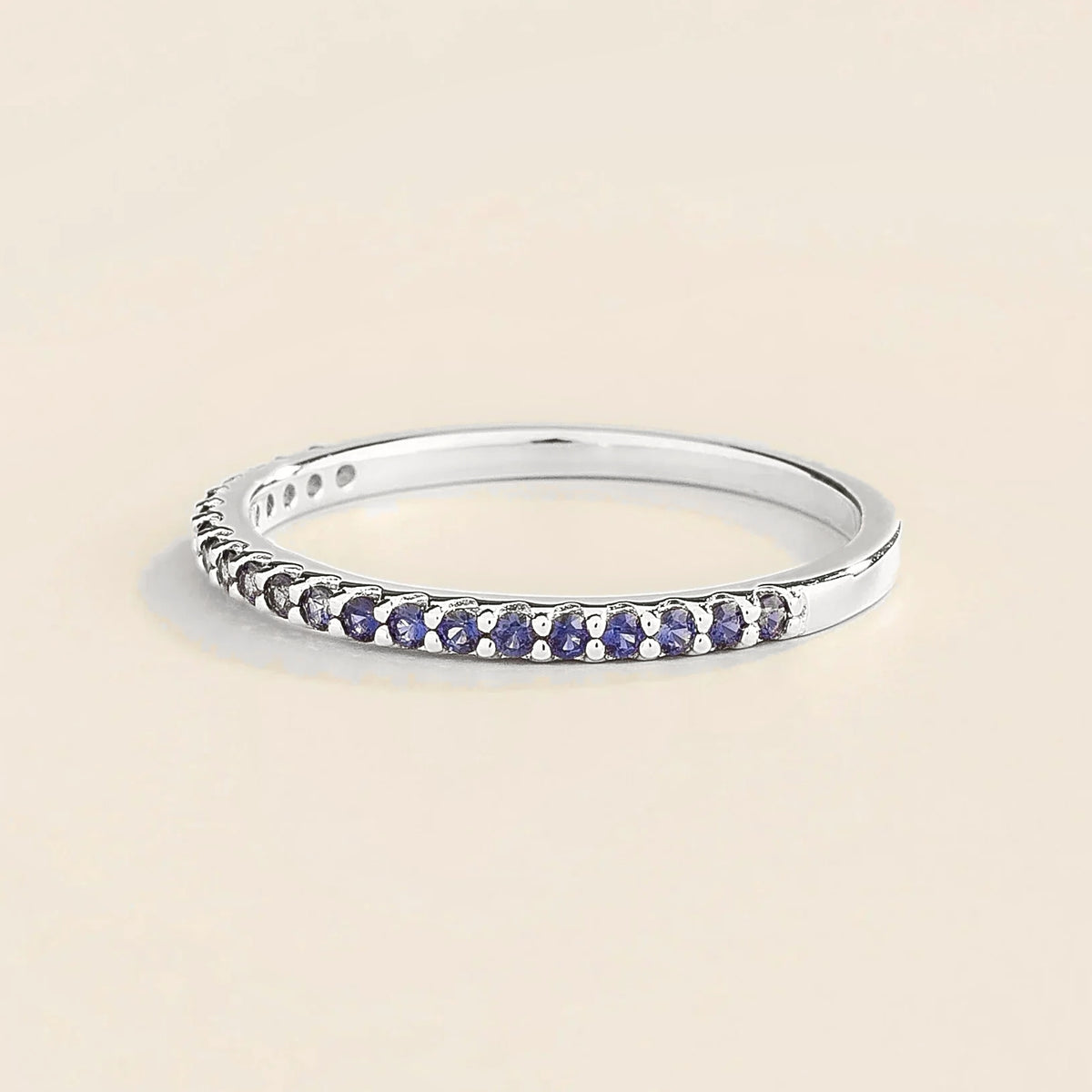 Blue Sapphire Half Eternity Band in White Gold