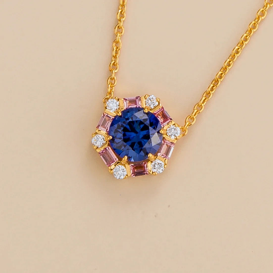Melba Blue Sapphire & Pink Sapphire Halo Pendant Necklace in Gold – angle view