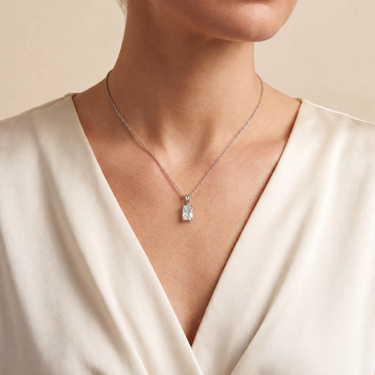 Clair radiant lab-grown diamond solitaire pendant necklace in white gold – on model | Juvetti