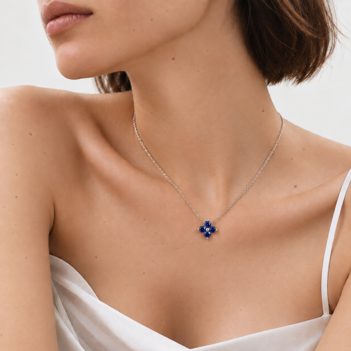 Clover Blue Sapphire Necklace In White Gold