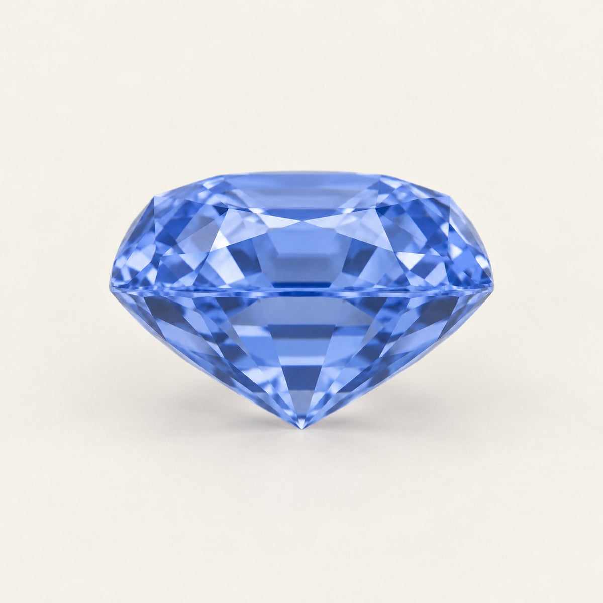 Cornflower blue lab-grown sapphire, cushion cut, side view