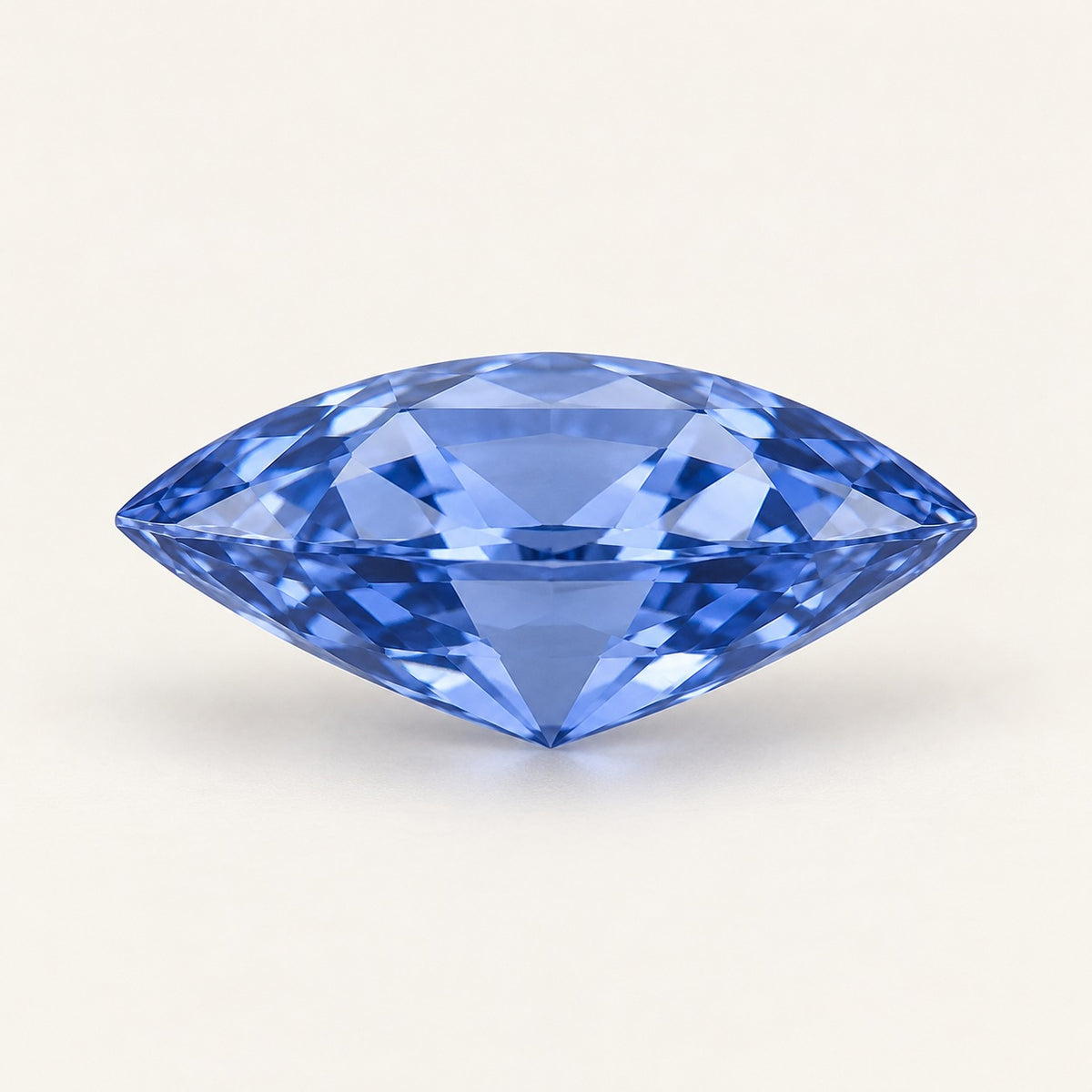Cornflower blue lab-grown sapphire, marquise cut, side view
