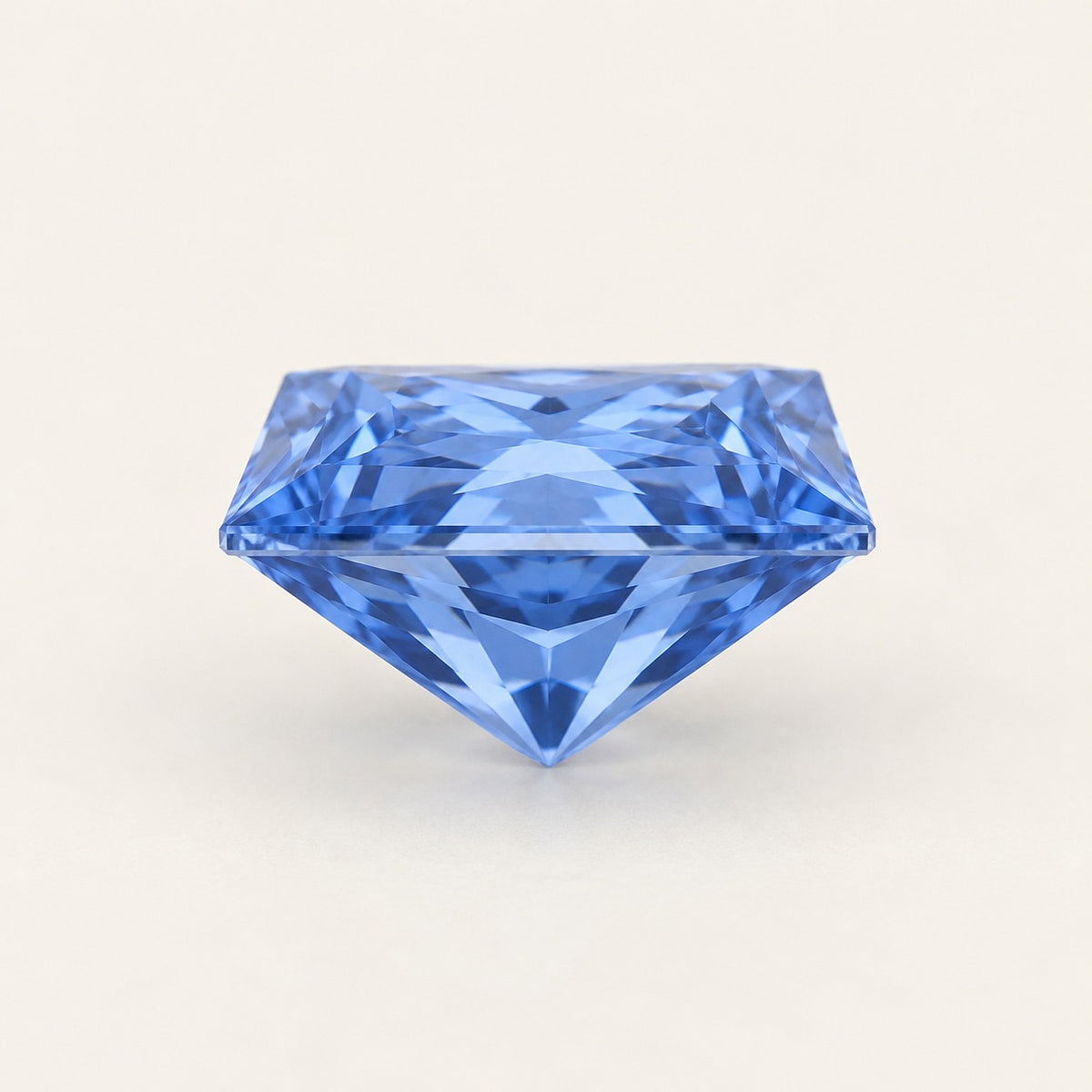 Cornflower blue lab-grown sapphire, princess cut, side view