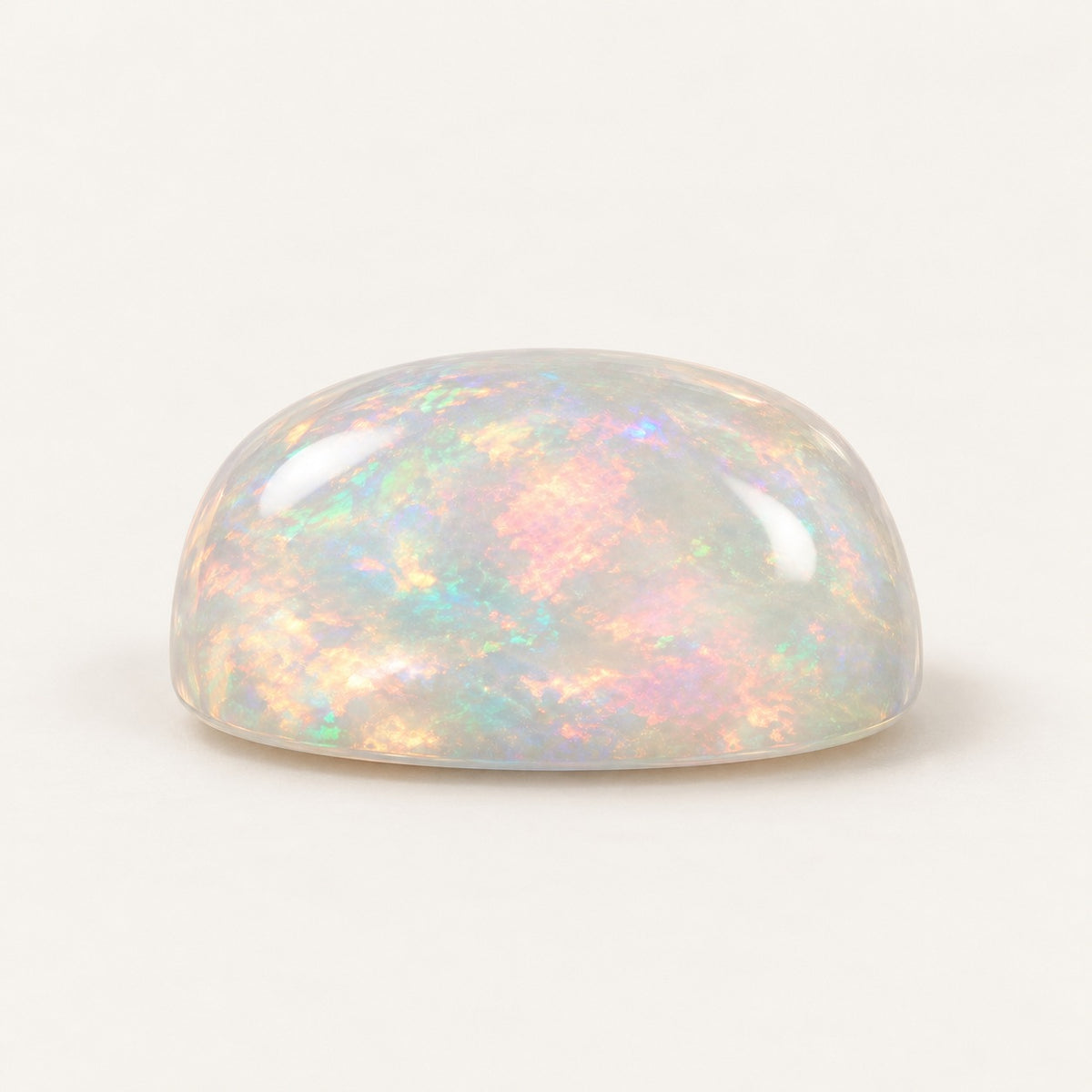 Crystal lab-grown opal, cushion cabochon, side view