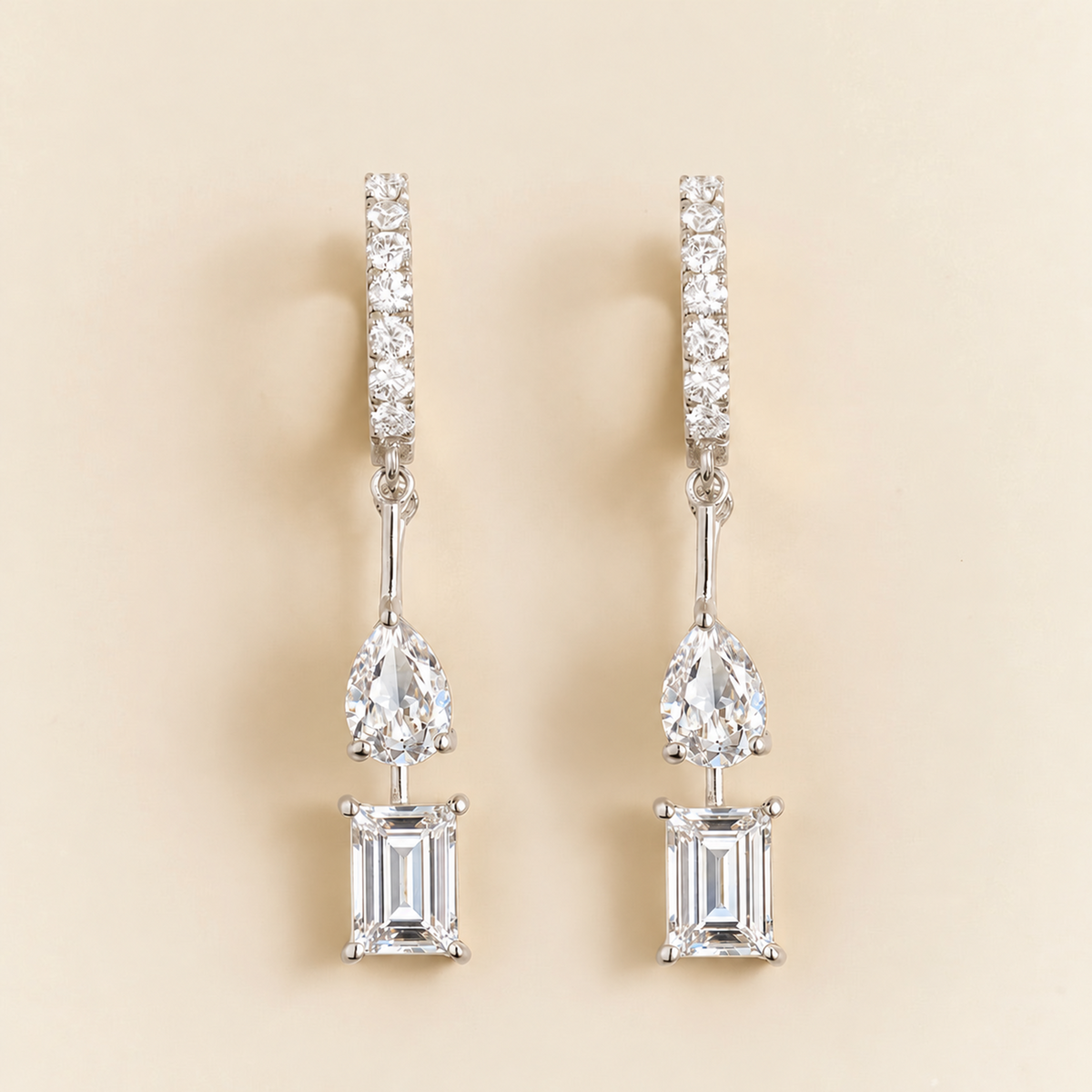 Faire Diamond Drop Earrings on Diamond Pavé Huggie Hoops in White Gold | Juvetti