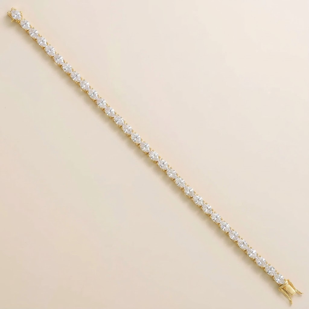 Salto oval diamond tennis bracelet in gold, angle view