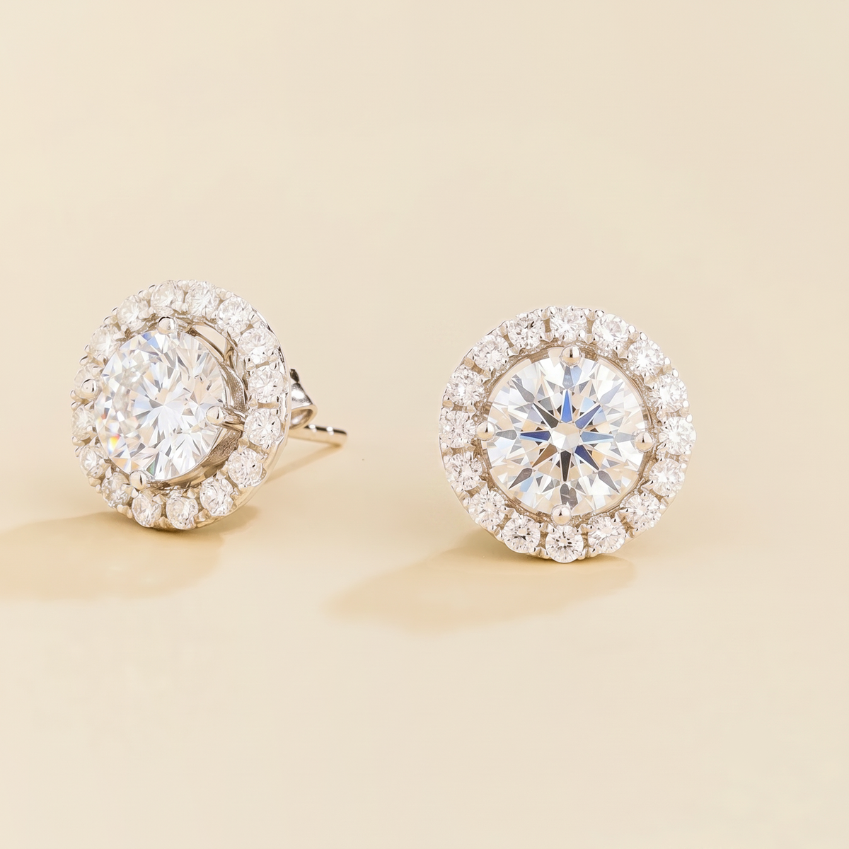 Floret round lab-grown diamond halo stud earrings in white gold – view 1 | Juvetti London