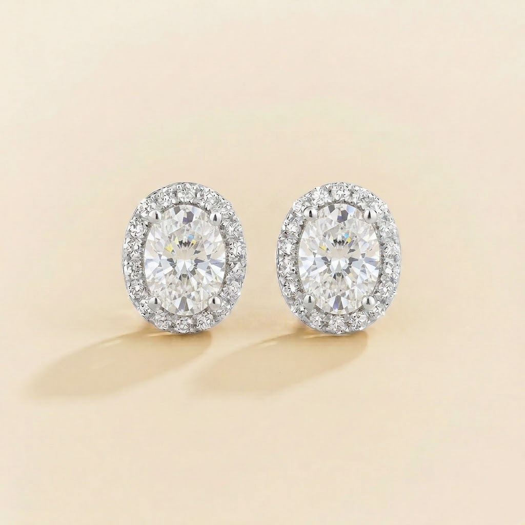 Mina oval diamond halo stud earrings in white gold, front view