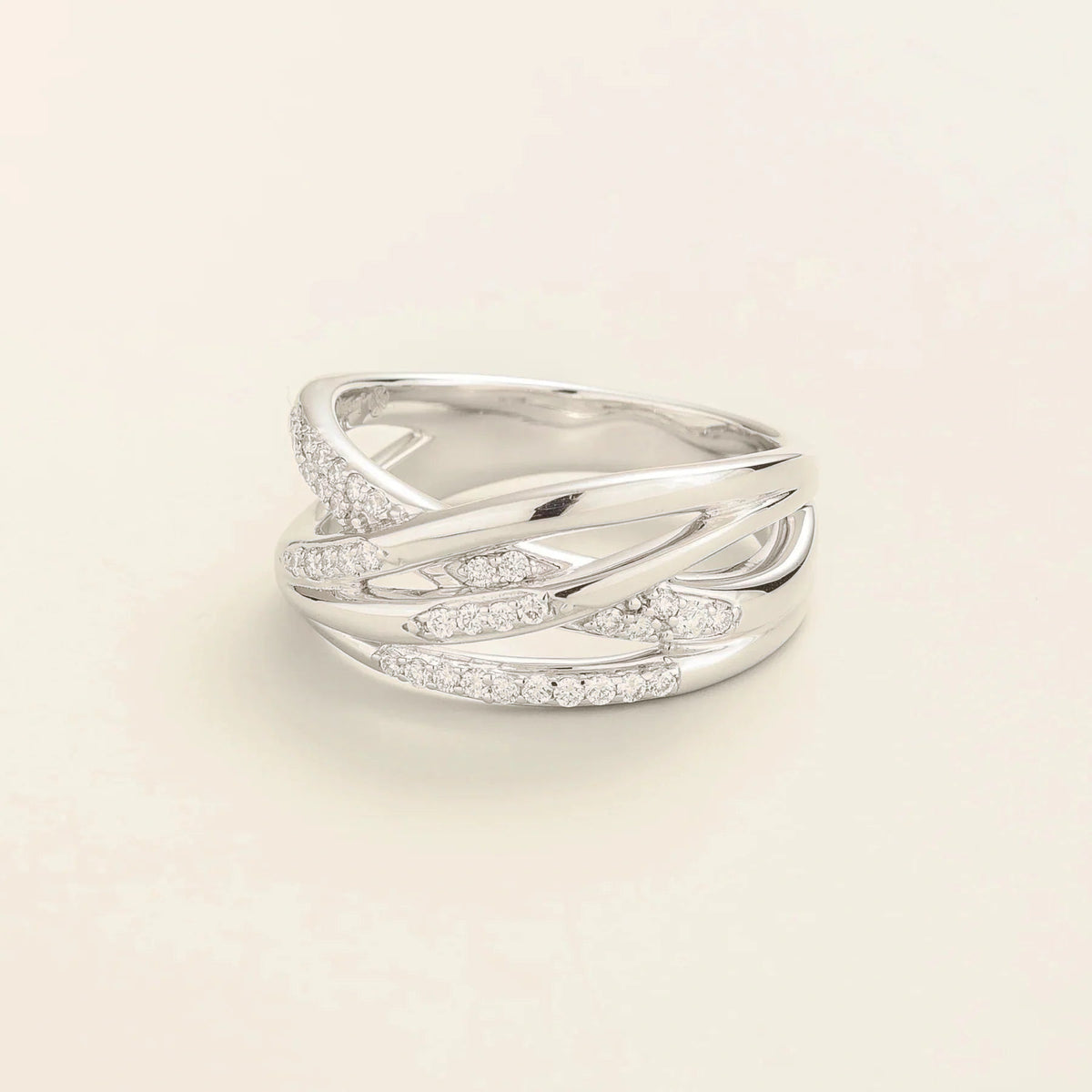 Val multi-row crossover band ring with lab-grown diamonds in white gold – angle view | Juvetti London