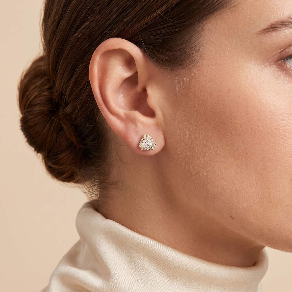 A model wearing Diana earrings set with lab grown diamonds