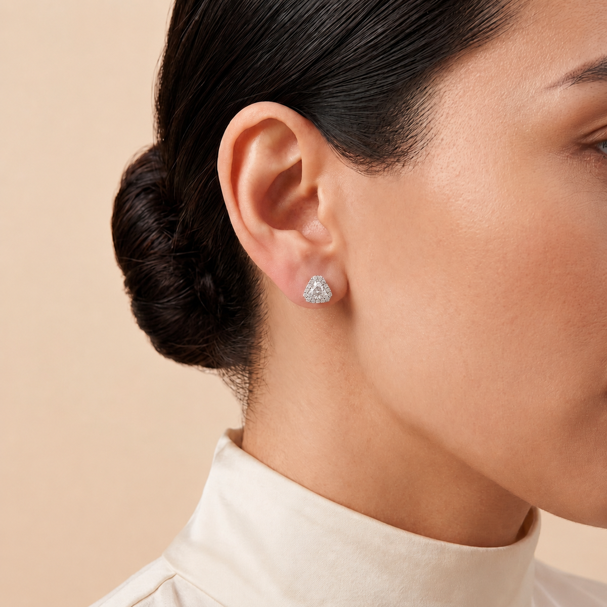 A model wearing Diana earrings set with lab grown diamonds