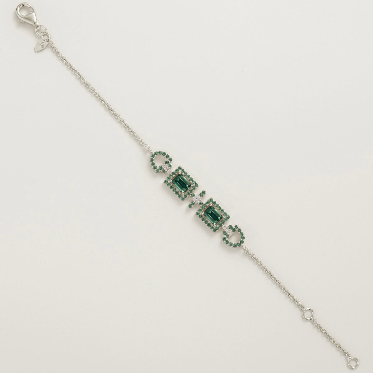 Ciceris emerald Art Deco halo bracelet in white gold, two emerald-cut lab-grown emeralds with diamonds, full length | Juvetti London