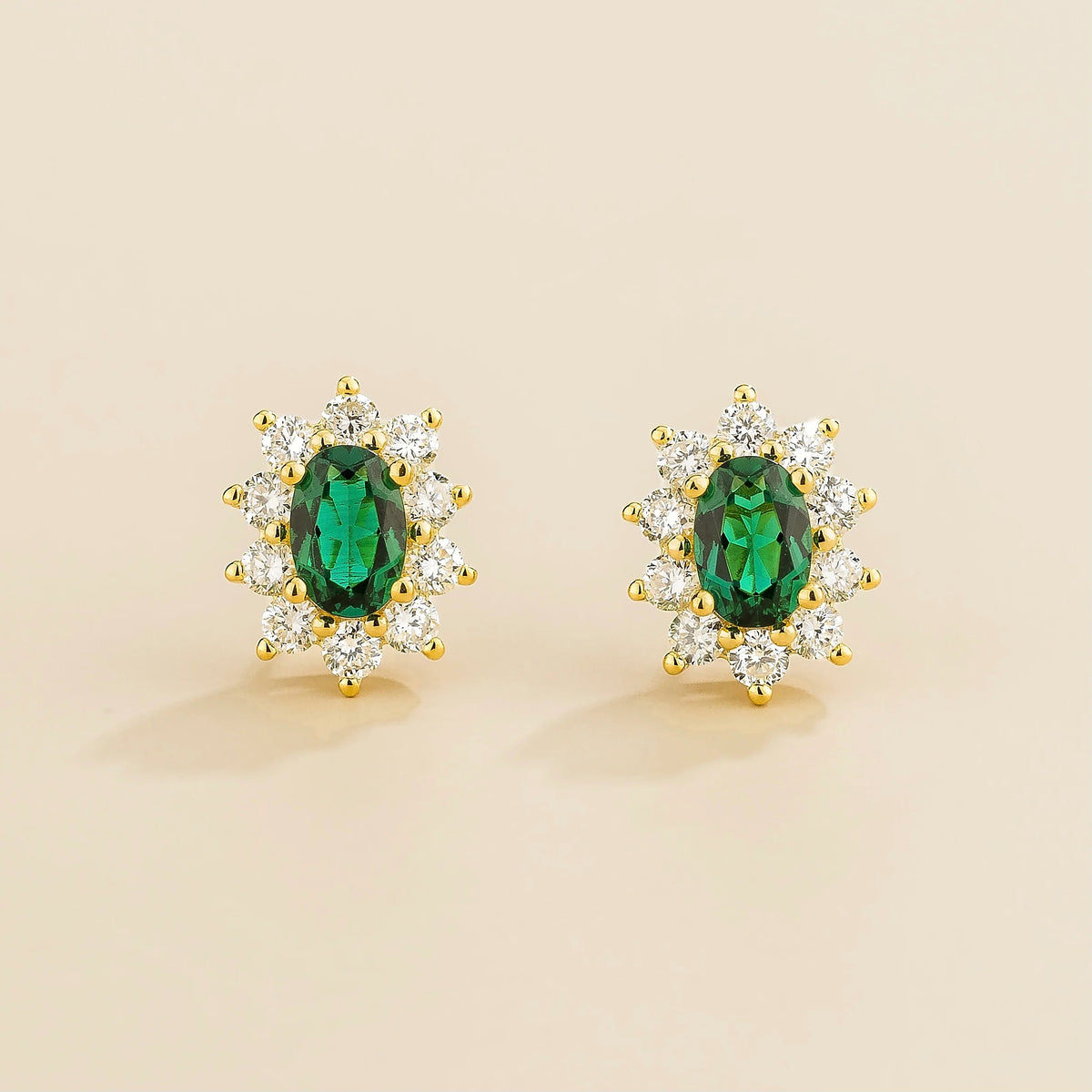 Oda oval emerald & diamond halo stud earrings in gold