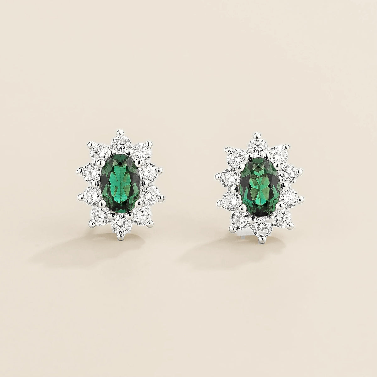 Oda oval emerald & diamond halo stud earrings in white gold