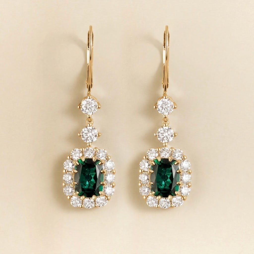 Pippa emerald and diamond halo drop earrings in yellow gold, front view