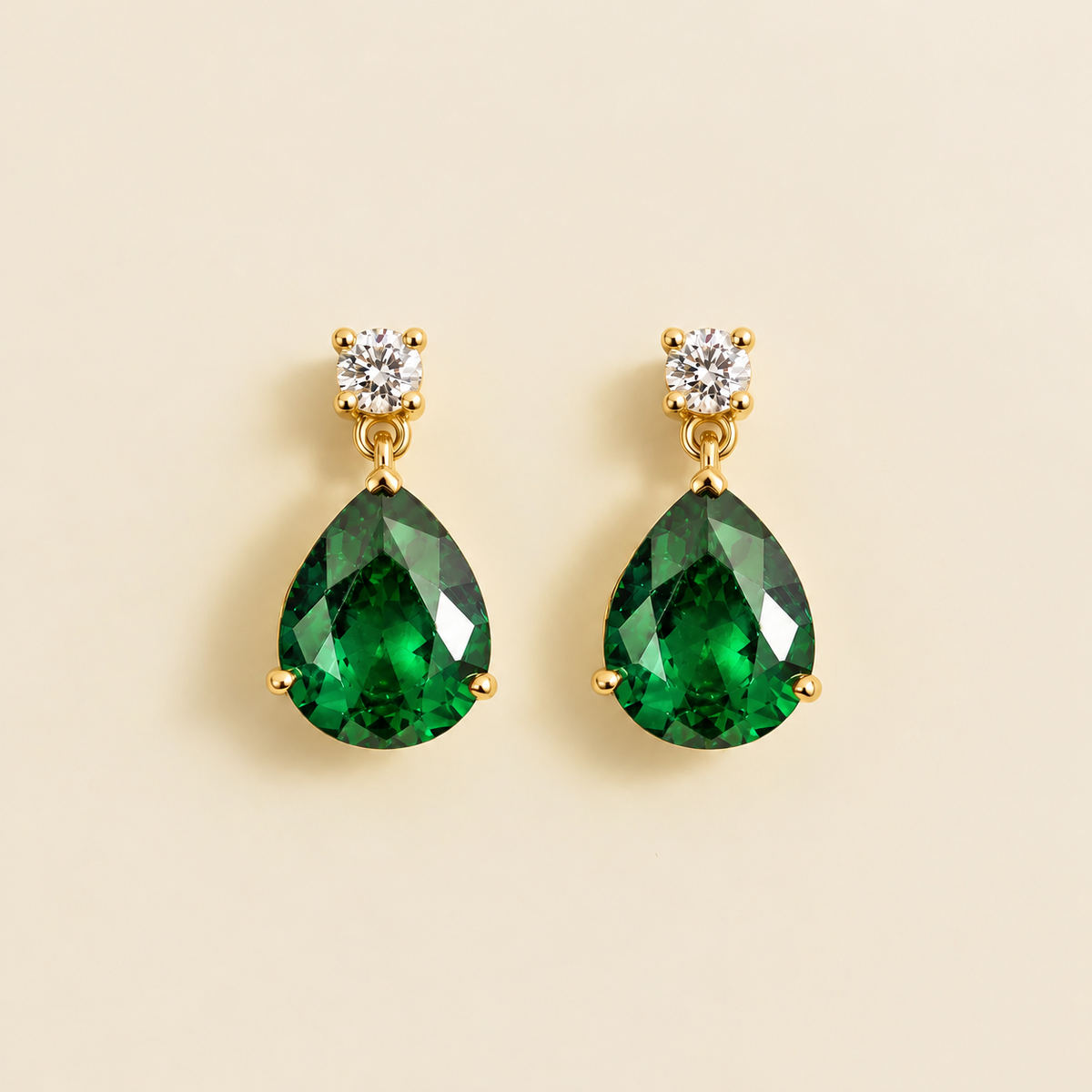 Medium lab-grown emerald and diamond pear drop earrings in gold – front view | Pisa by Juvetti
