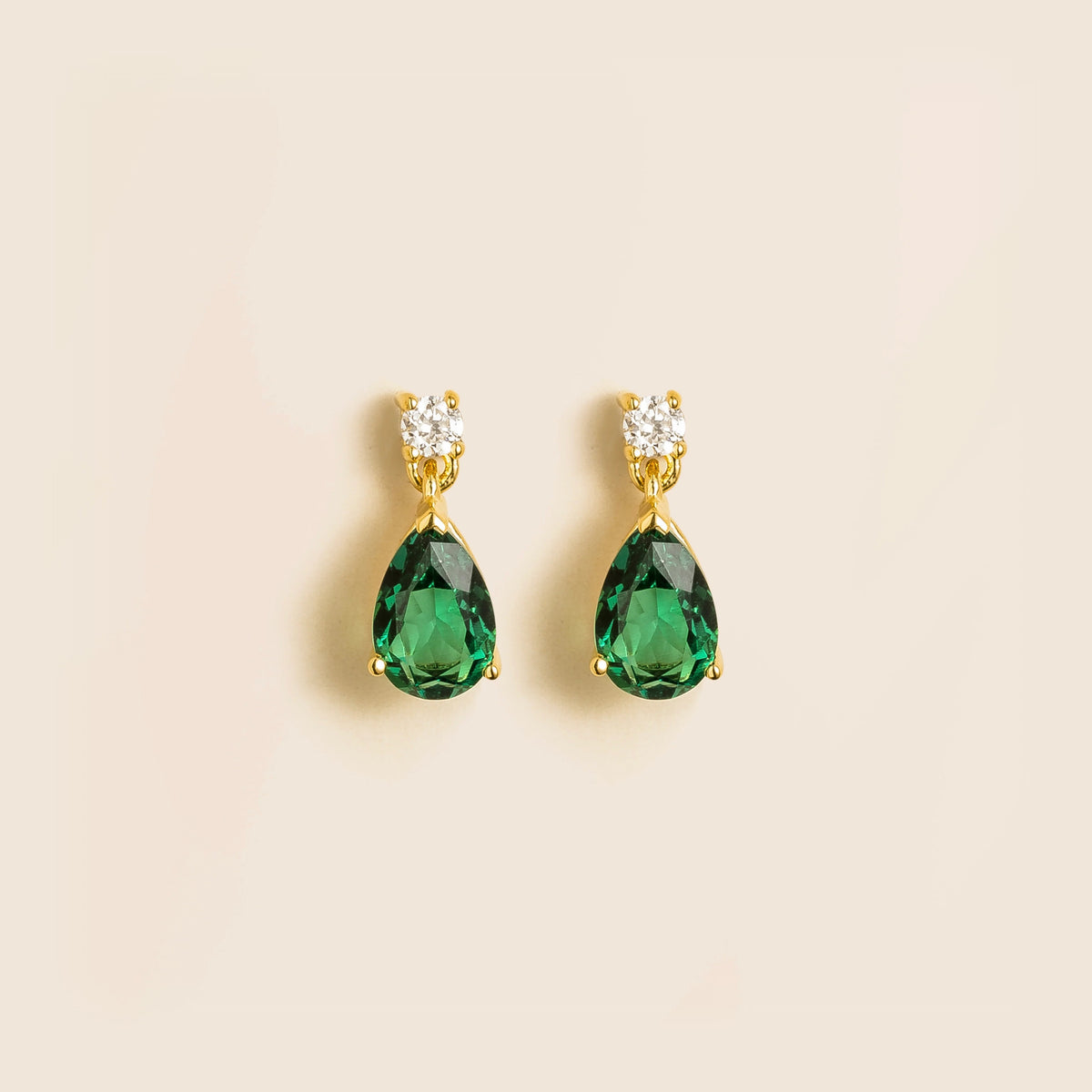 Lab-grown emerald and diamond pear drop earrings in gold – front view | Pisa by Juvetti