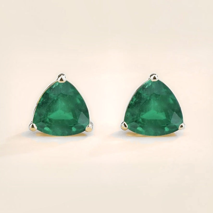 Trillion emerald solitaire stud earrings in white gold