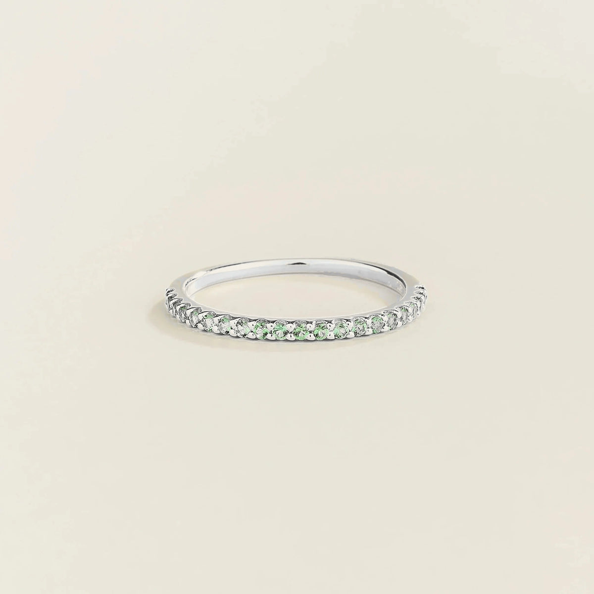 Stacy emerald half eternity band in white gold