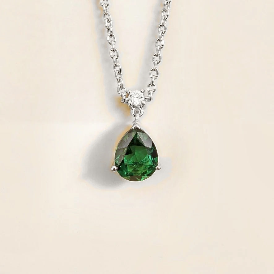 Lab-grown emerald and diamond pear drop pendant necklace in white gold, medium – front view | Pisa by Juvetti