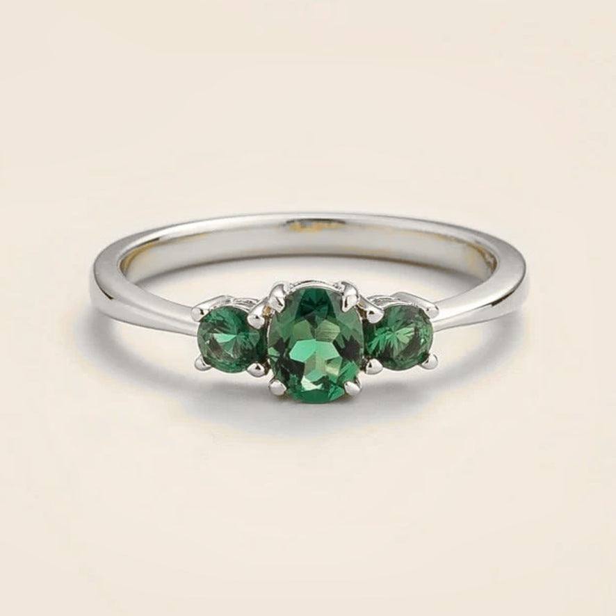 Boble emerald oval three-stone ring in white gold