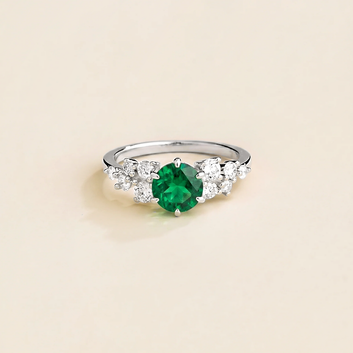 Floret round lab-grown emerald and diamond cluster ring in white gold – front | Juvetti London