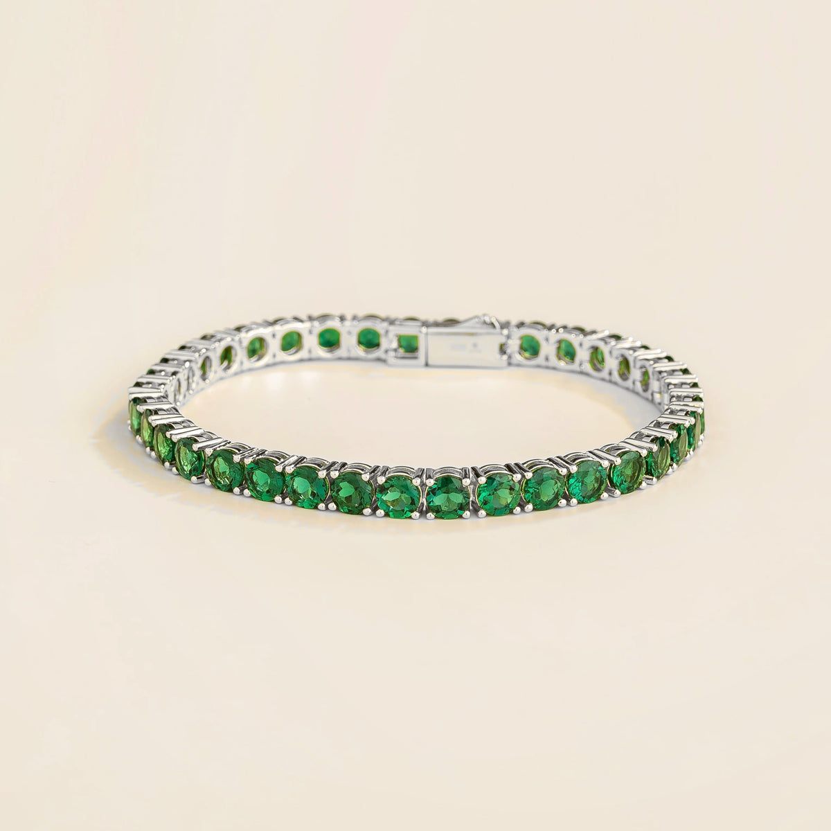 Round Emerald Tennis Bracelet in White Gold