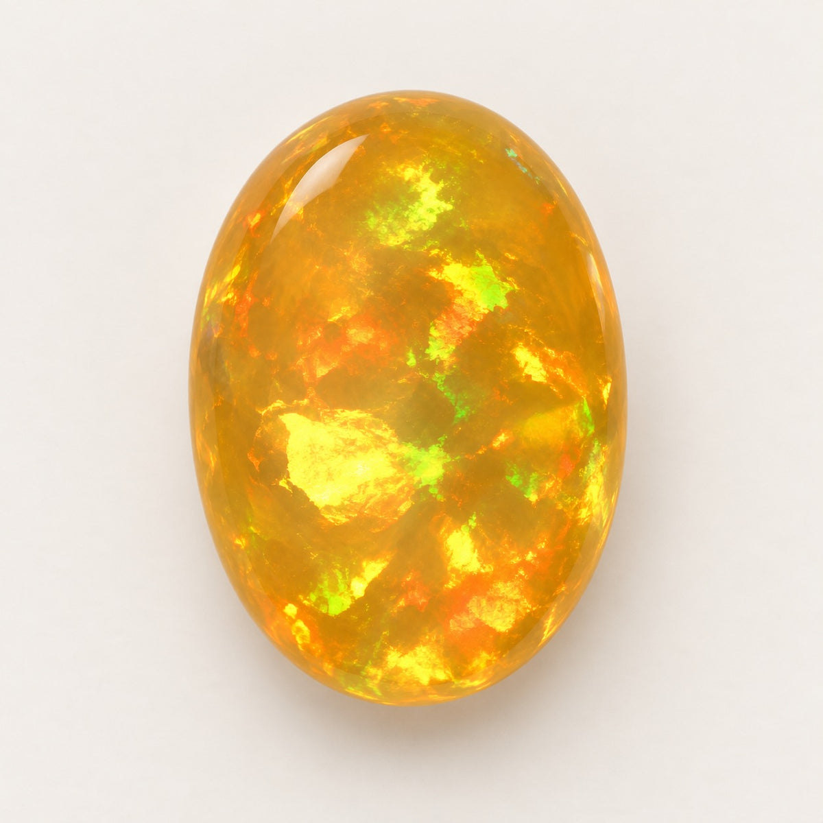 Fire lab-grown opal, oval cabochon