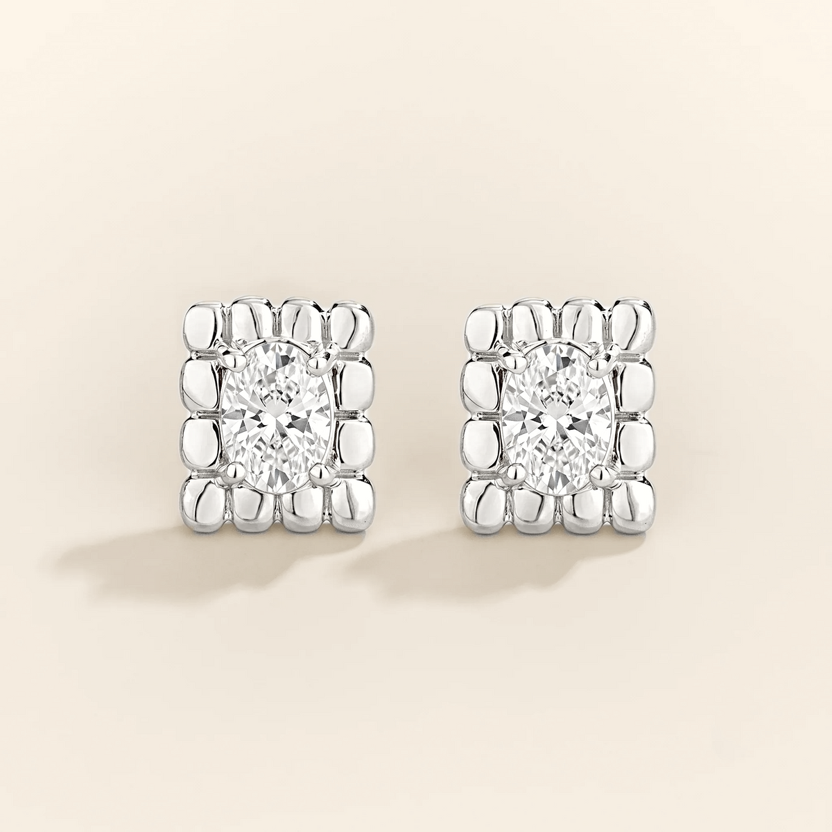 Fondi oval lab-grown diamond sculpted stud earrings in white gold – front view | Juvetti London