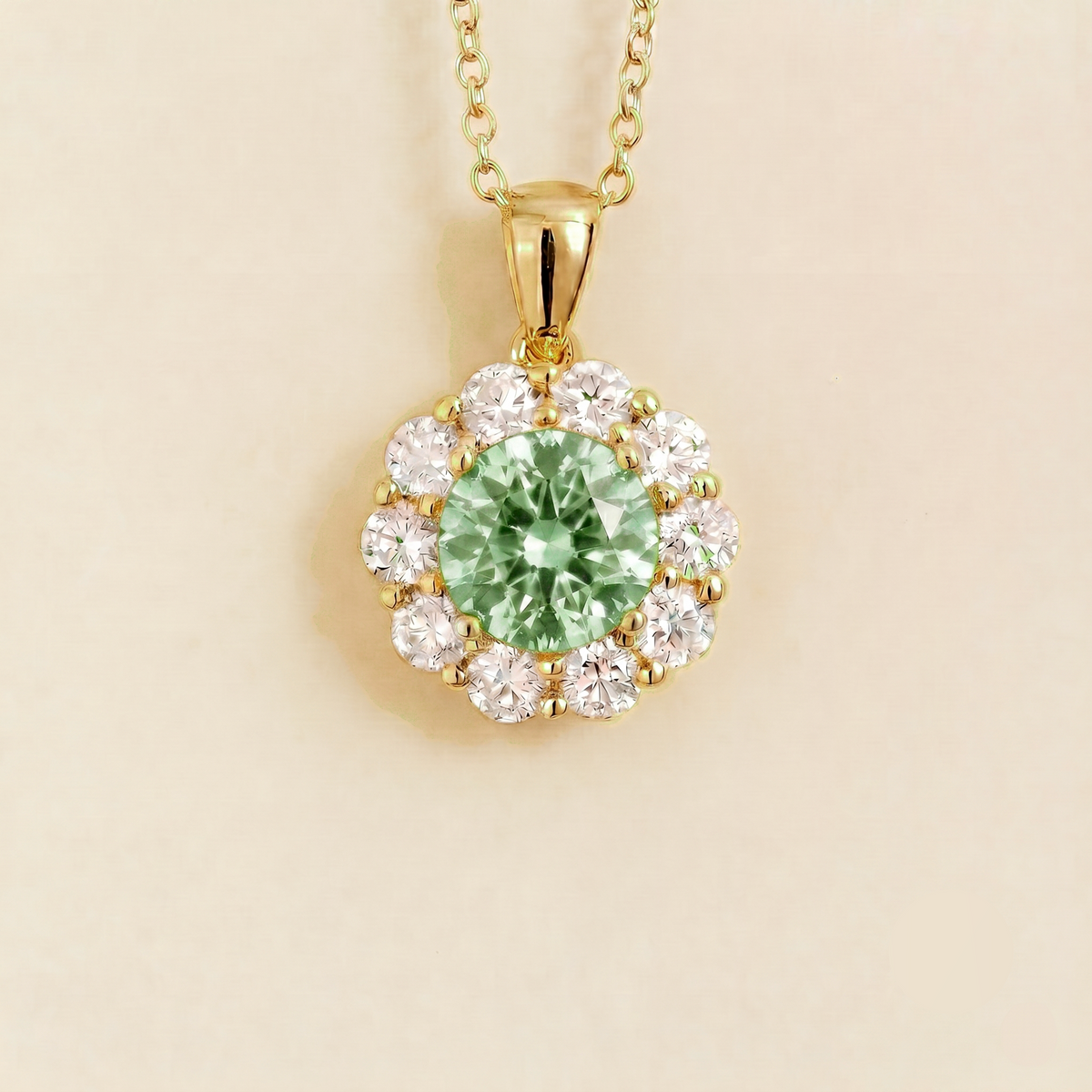 Floret round lab-grown green sapphire and diamond halo pendant necklace in gold – front | Juvetti London