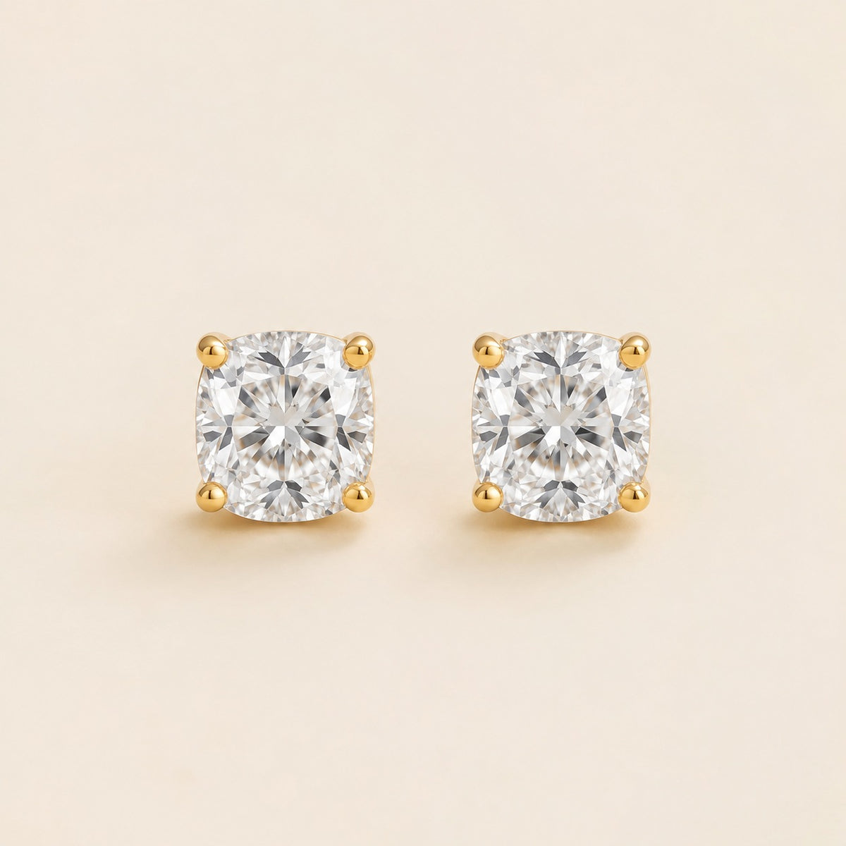 Iris cushion lab-grown diamond solitaire stud earrings in gold – front view | Juvetti