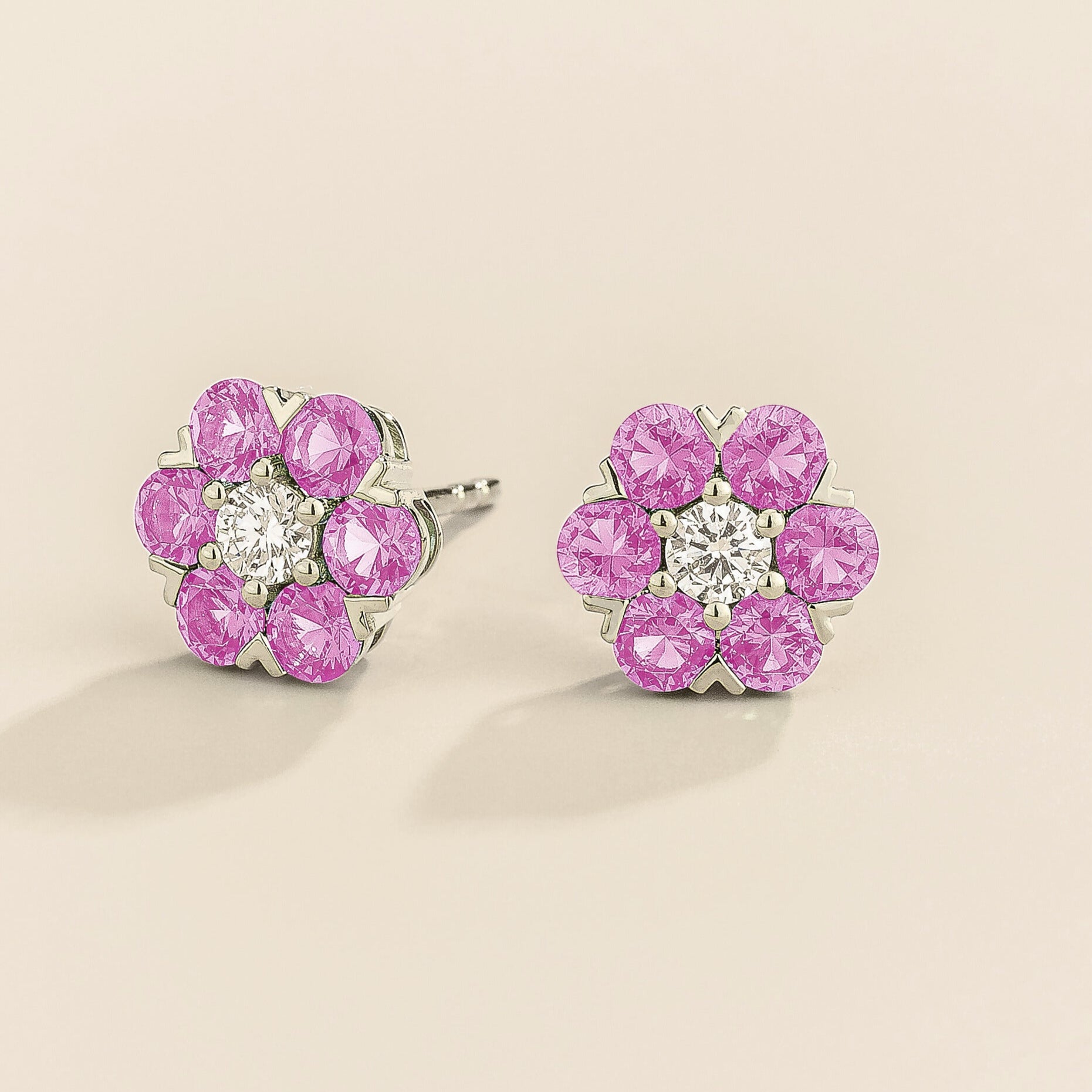 Image of Juvetti's Cinq earrings in white gold set with pink sapphires and diamond.