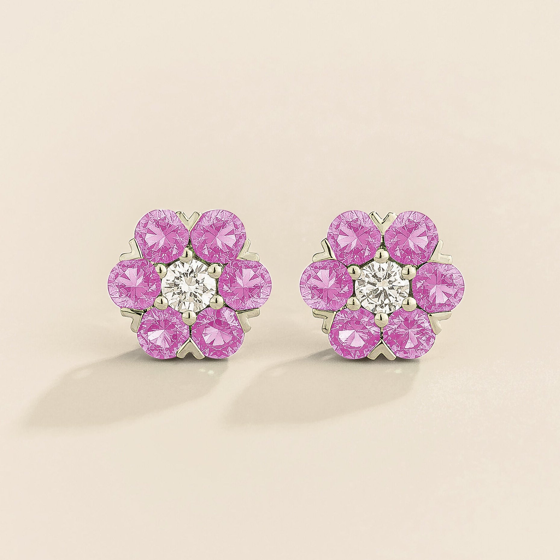 Image of Juvetti's Cinq earrings in white gold set with pink sapphires and diamond.