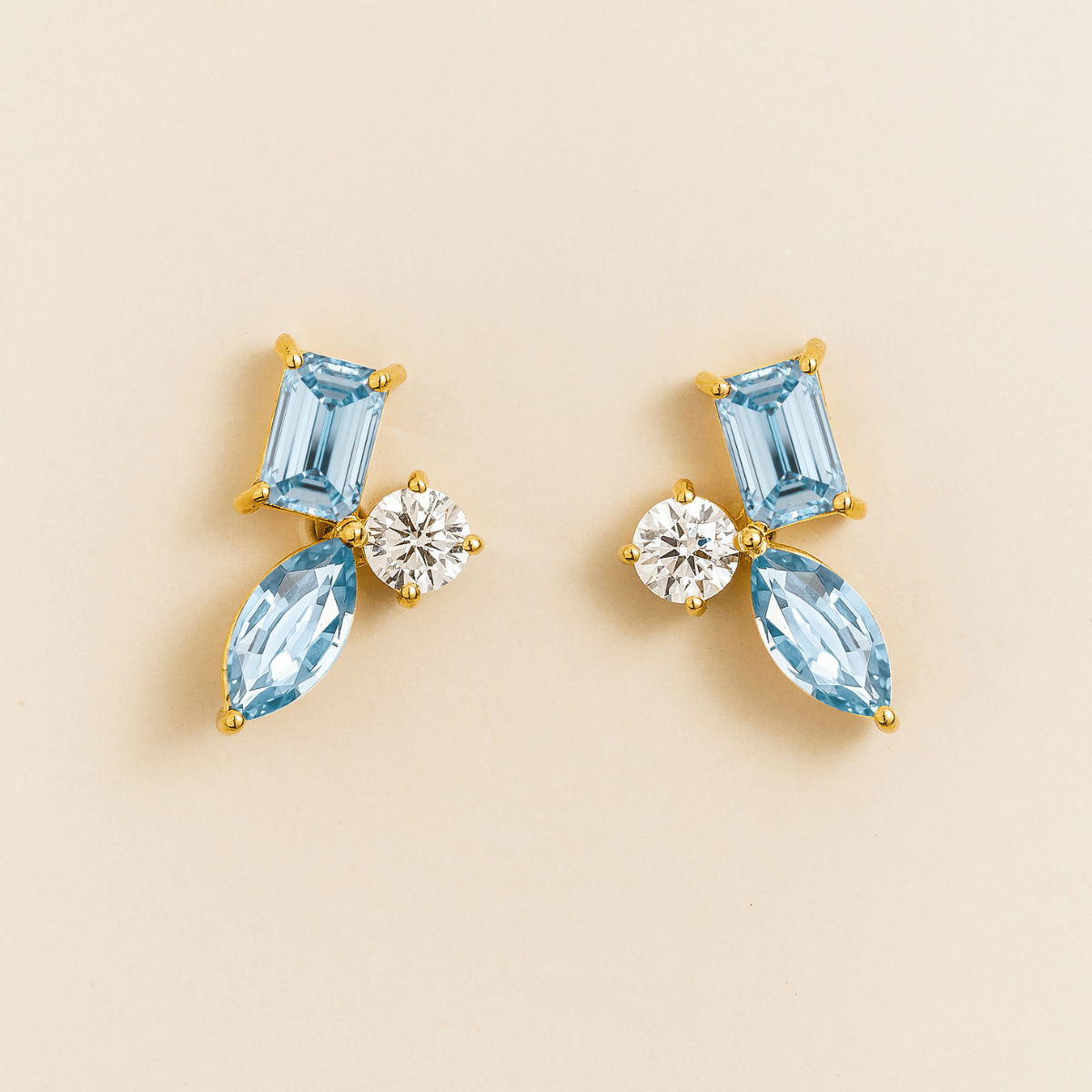 Sanka aquamarine cluster stud earrings in gold: baguette and marquise lab-grown aquamarines, round diamond