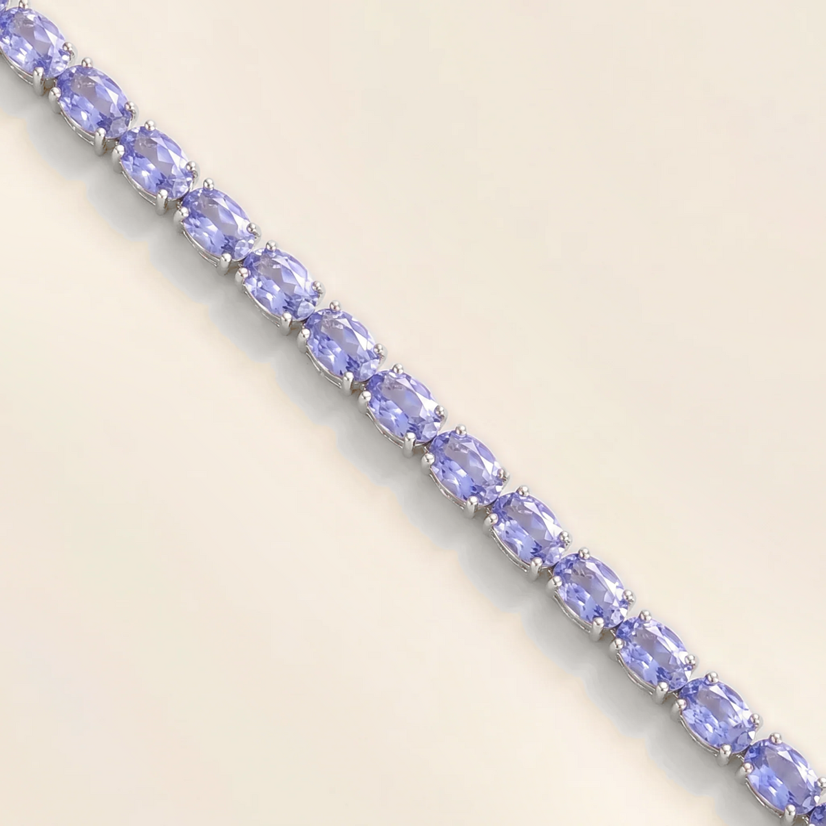 Salto light blue sapphire oval tennis bracelet in white gold, view 2