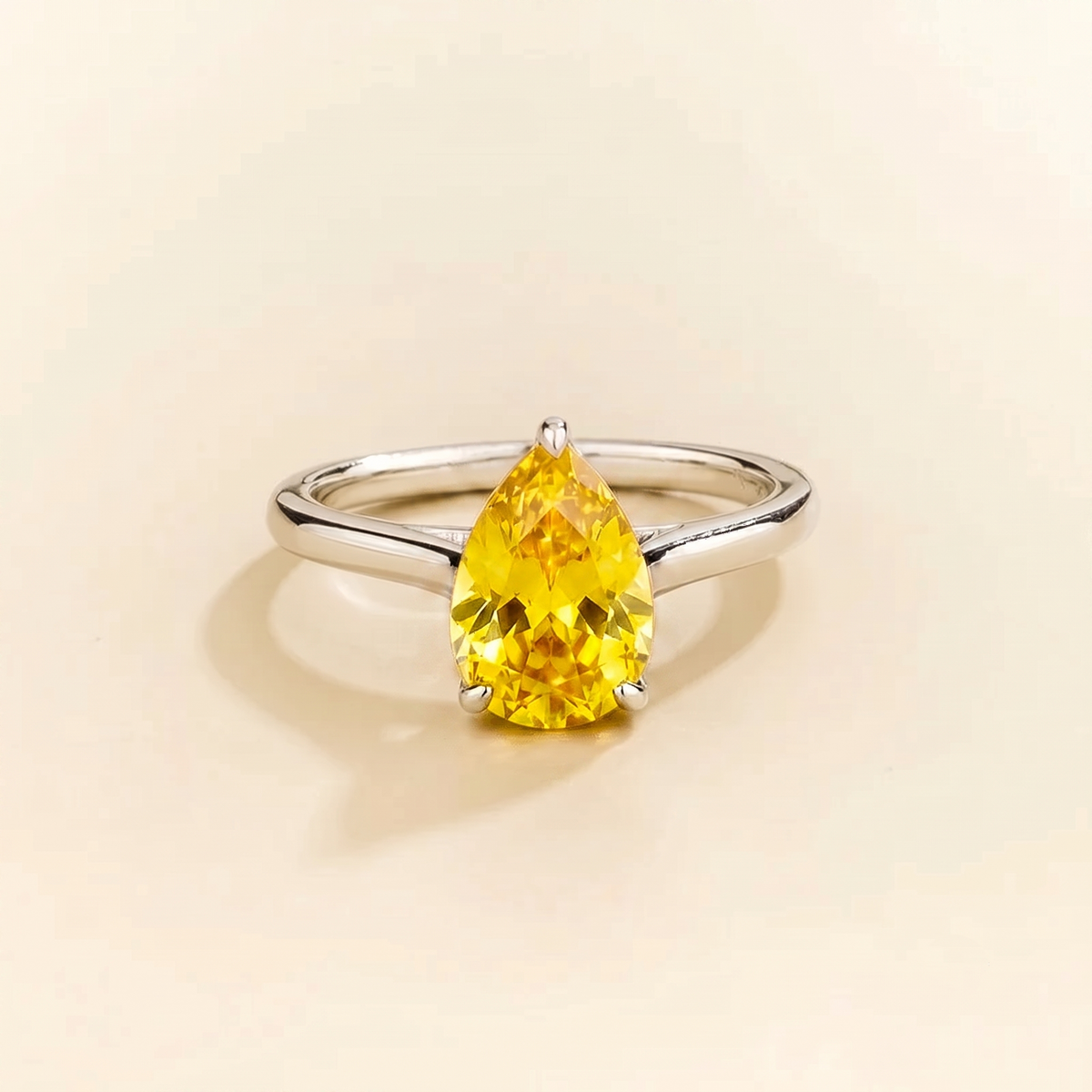 Pandal pear shape yellow sapphire cathedral solitaire ring in white gold
