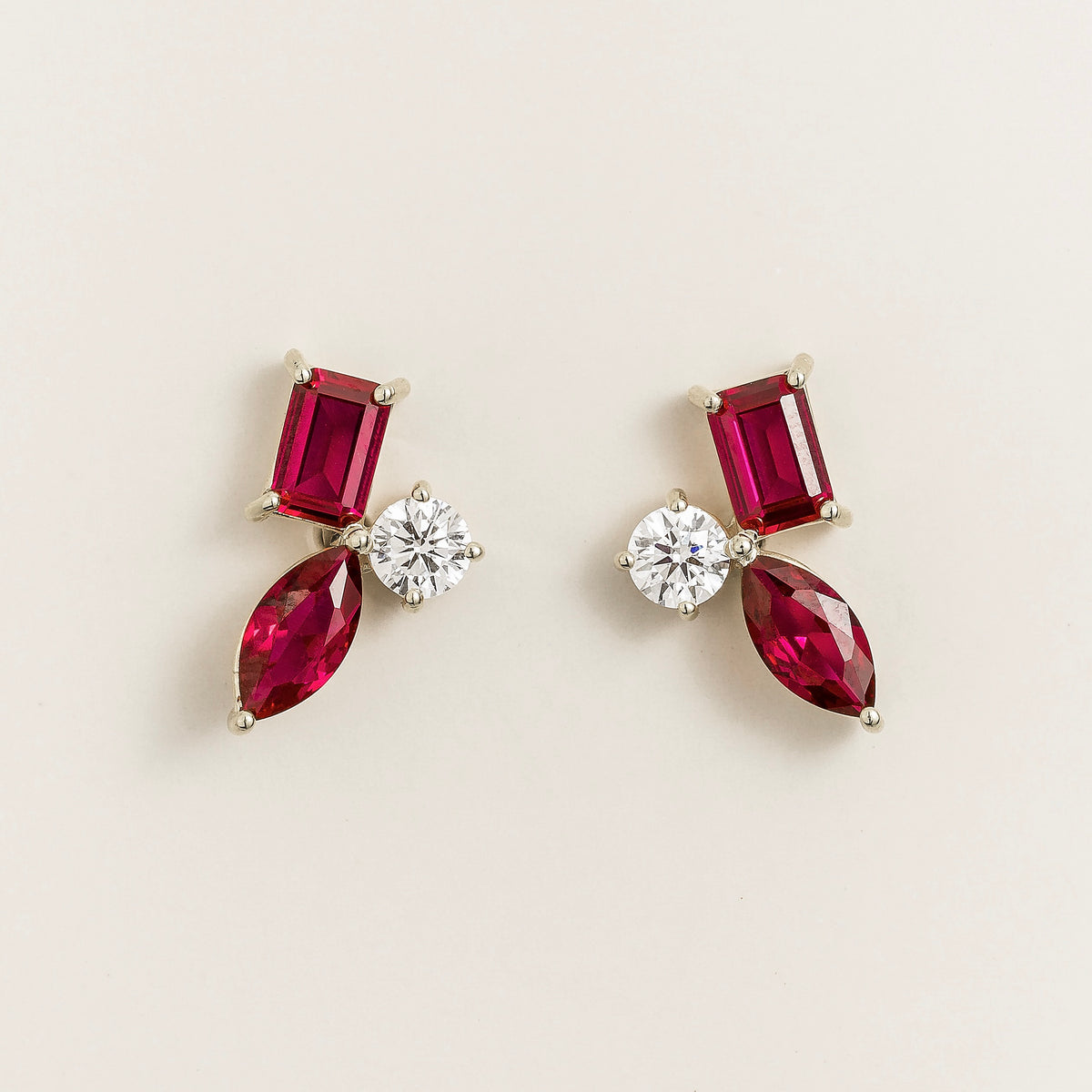 Sanka ruby cluster stud earrings in white gold: baguette and marquise lab-grown rubies, round diamond